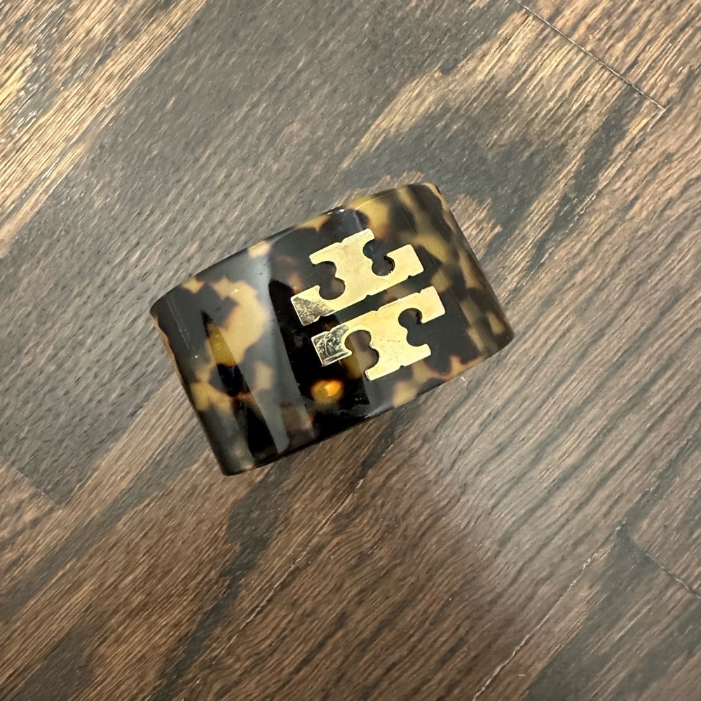 Tory Burch tortoise bracelet.